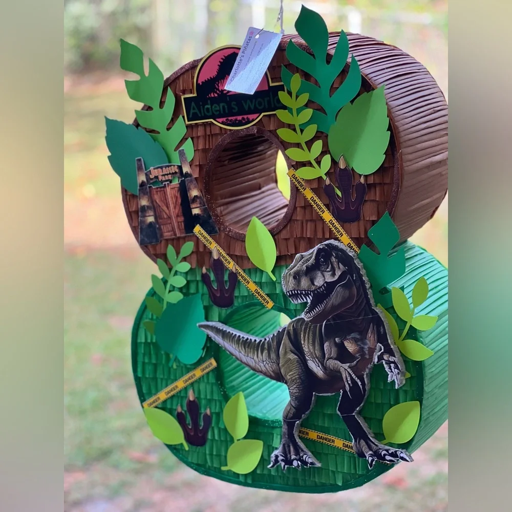 Dinosaur-Themed Party Decoration with Green and Brown Accents